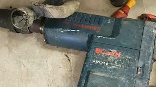 Installing a Bosch service kit in a Bosch GSH 11 E hammer.