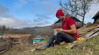 A father and son are dismantling an old building. Hard work in the mountains Part 2