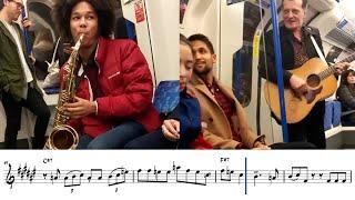 pro musician jams with street performer on subway