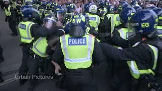 Police officer strikes protester in the face during London demo