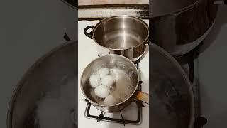 Checking on the white eggs  their still boiling