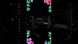 Sash Stangs and Voulé in Hawaii night view from Hilton Garden Inn Waikiki Beach