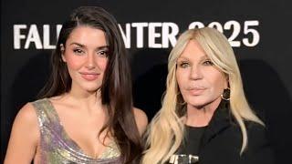 Hande Erсel poses with Donatella Versace at Milan Fashion Week