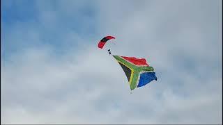 Airshow: Paragliders bring the SA flag in