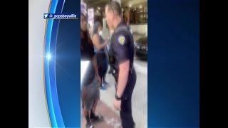 WEB EXTRA: Officer Shoves Protester To Ground