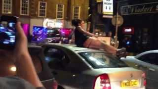 Girl fingering herself in public on a car