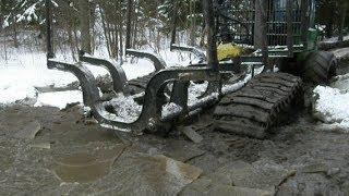 Forwarder John Deere 1010D logging in mud, extreme conditions