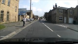 Teen steps into road without looking, friend stops him