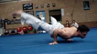 Straddle Planche Clap Pushups