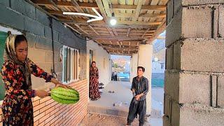 "Delightful porch: completion of cement work and lighting of Razia's house"