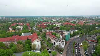 Forwards fly above city. Aerial view of apartment houses in residential urban neighbourhood. Spandau