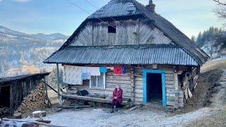 Simple life of a grandmother on top of a mountain far from civilization