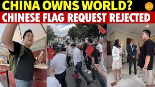 World Owned by China? Chinese Insist on China's Flag at Paris Hotel, Harshly Denied