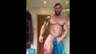 Muscle god Andrew Pickering flexing back muscles after a nice shower