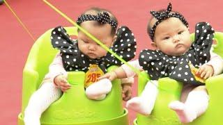 Hundreds of Twins Gather in S China Twins Festival