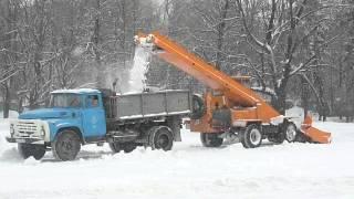 Russian snowloader KO-206AN loadin"ZIL-MMZ dump truck