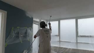 Frog Clan Painting Group Stephan spraying ceilings.