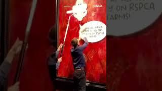 Moment animal rights activists deface King Charles portrait in London | #shorts #yahooaustralia