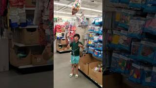 Zayan is Showing His Favorite Birthday Balloons at Dollar Tree