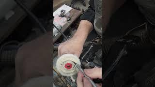modified this small buffing wheel to fit my flex shaft handpiece.  works so good it's ridiculous.