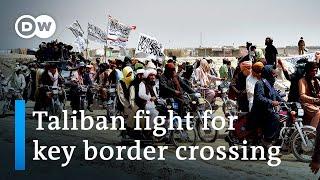 Afghan forces fight to retake Pakistan border crossing from Taliban | DW News