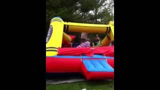 Parents and kids on a bounce house fail