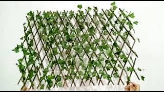 Wall decoration piece made up of artificial leaves and sticks (large)