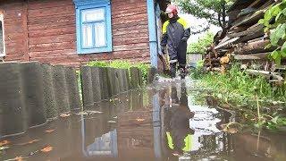 Последствия проливных дождей в Пинске -  из дворов пинчан откачивают воду