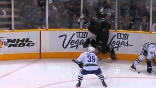 Keith Ballard hipchecks Jamie McGinn