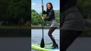 Wetlook in Shorts and Shirt in the River