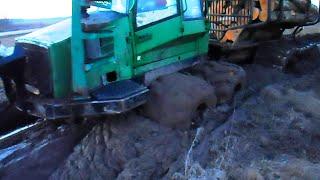 John Deere 810D in deep mud, difficult conditions