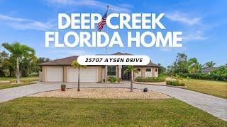 Stunning Deep Creek Pool Home on a Double Lot! | 25707 Aysen Drive, Punta Gorda, FL 33950