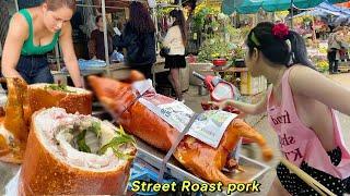 BBQ The couple sells the best roast pork at the market gate, everyone comes to buy.