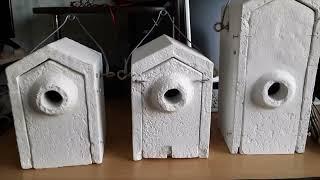 wooden concrete birdhouse