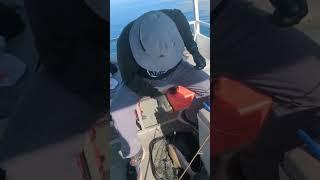Coach Angelo demonstrates fishing techniques at Panguitch Lake