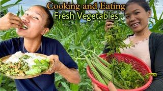 Collecting Cooking and Eating Green Vegetables || FiddleHead Fern Cooking and Eating || Village Life