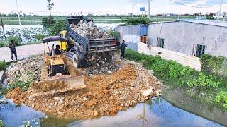 WOW !! An interesting new project using Bulldozer Komatsu pushing rocky soil into the water.