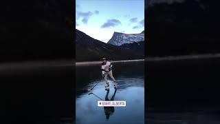 Kyle playing ice hockey in Banff, Alberta