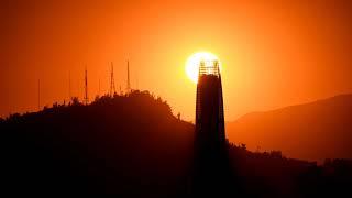 Time lapse: Sun setting in Santiago de Chile, eclipsed behind the Gran Torre Santiago skyscraper