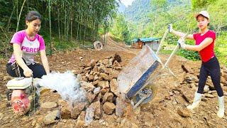 She picked up stones to level the house's floor and washed the fish tank - building a new house