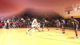 Jacksonville’s David Pickett with a layup vs Northside in Onslow County Classic