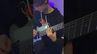 Tim Henson playing Tosin Abasi signature guitar