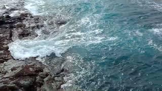 watching the waves at Sao Roque, Portugal