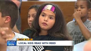 Local children read with Reed