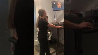 Medical Aesthetician Moonia Perez showing off our Reveal Camera at Contoura Facial Plastic Surgery