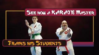 Karate master guiding his Student