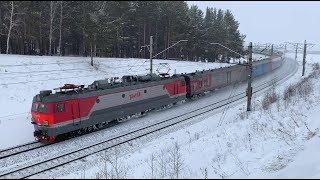 Train from Mongolia. Russian trains in snowfall. Freight trains in winter