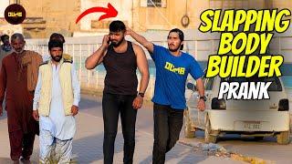 Slapping Body Builder Prank - Dumb TV