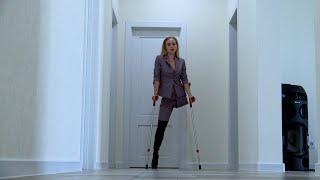 Elena amputee preview - Walking in a trench coat. Pt.1