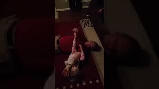 Mixed wrestling match 1yr old baby girl beats daddy